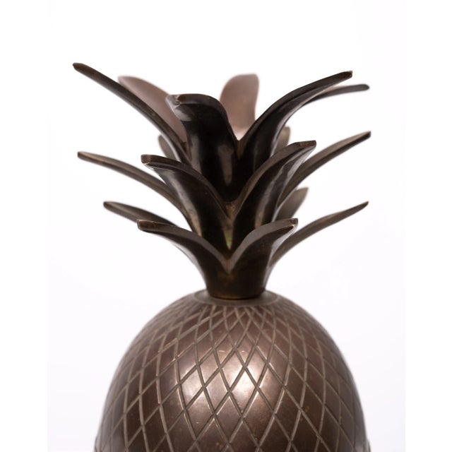 This beautiful vintage style pineapple is made of brass, comes with a Bronze color patine .Perfect for a mid-century...