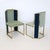 Set of six brass framed upholstered dining chairs with contrasting upholstered panel backs. The upholstery is featured to...
