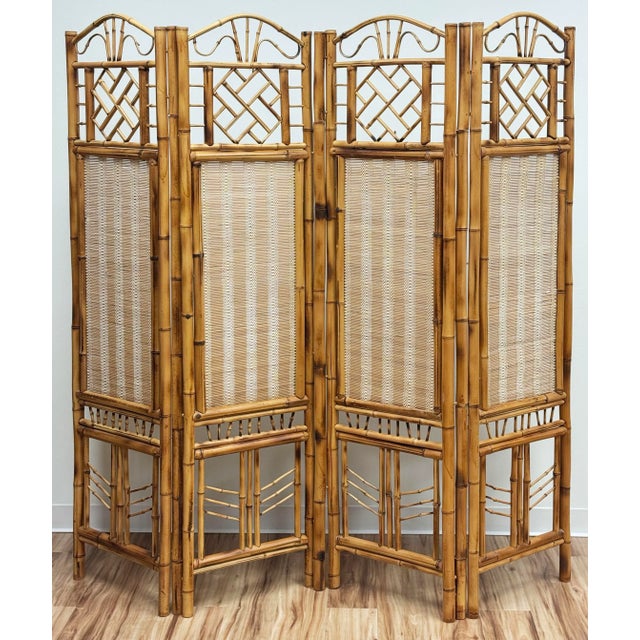 Vintage Chinese Chippendale style slatted bamboo room divider. Features privacy screen fabric to center panels with...