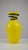 Striking sculptural art glass vase featuring a vibrant yellow body with subtle internal streaking and a dramatic cobalt...