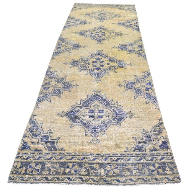 Hand-knotted with care using traditional rug-making techniques, this wool rug blends timeless craftsmanship with a modern...