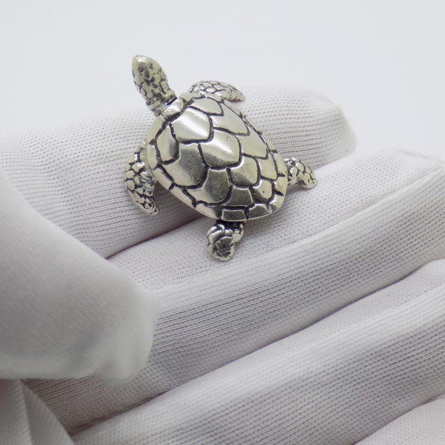 A charming vintage miniature depicting a loggerhead sea turtle, handmade in Italy between the 1980s and 1990s in genuine...