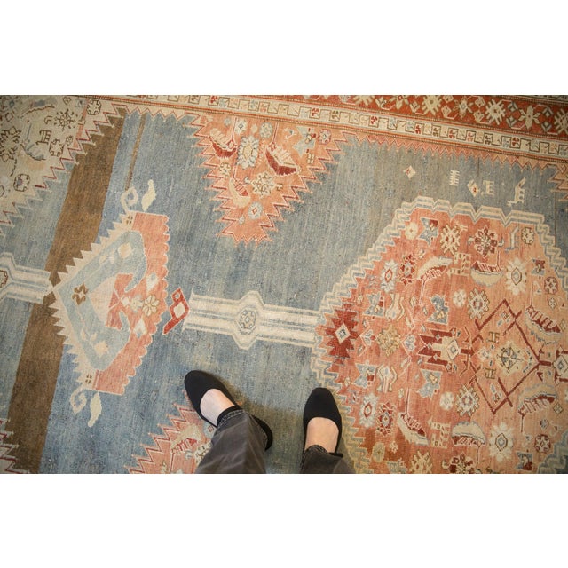 :: Large center hexagonal center medallion with interior delicate partial Herati drawing adorned at either end by long...