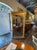 This 19th c. Swedish Neoclassical Giltwood Mirror exudes elegance and sophistication with its intricate design and gold...