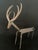 A striking hand-forged wrought iron deer sculpture. Purchased in 2006, this piece beautifully showcases the late-1990s and...