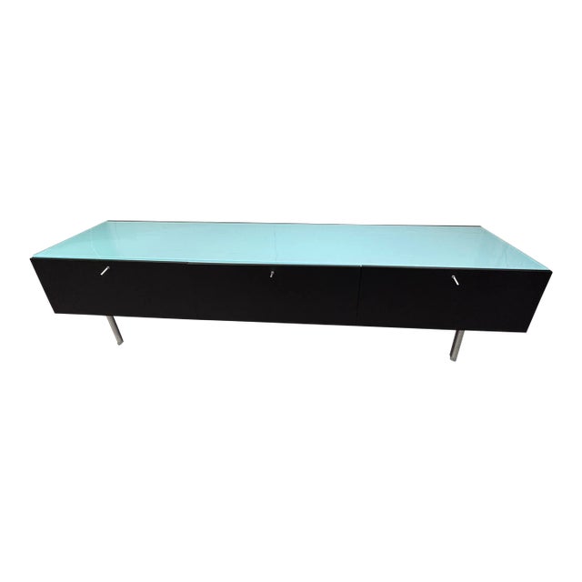 Design Plus Gallery presents a Flat Series Credenza from Cassina. Designed by Piero Lissoni. Stained black finish with...
