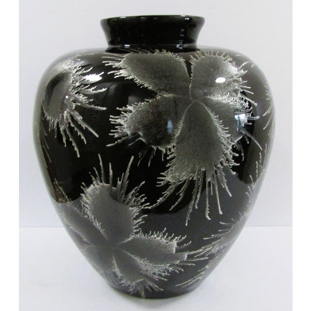 Crafted with an eye for elegance, this Vintage 1960s large vase combines the natural charm of bamboo with the...