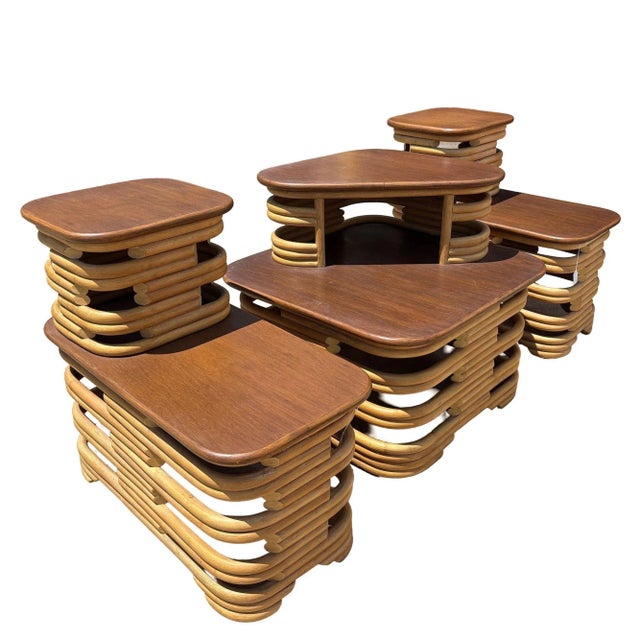 This beautifully restored pair of Mid-century two-tier stacked rattan end tables and included corner table with cut-out...