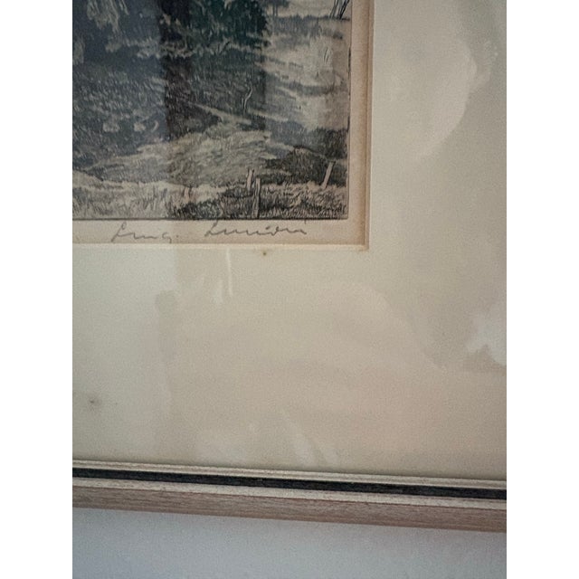 “Classic Pastures” signed etching by noted artist Luigi Lucioni. Made in 1942. Matted and framed. Luigi Lucioni was an...