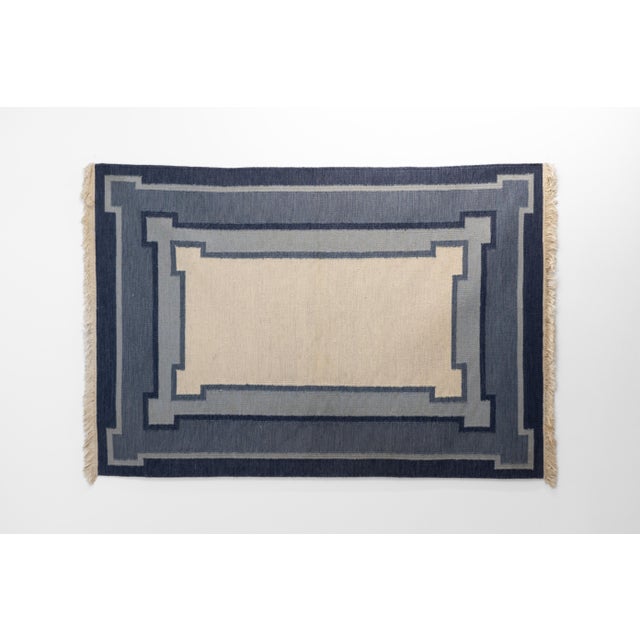 Vintage Swedish kilim in stepped blue tones. Unusual design. Sweden circa 1960. All our rugs undergo a professional...