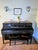 Elegant Edwardian style and streamlined "modern" for the 20th century. Imported Honduran Mahogany wood under the black...