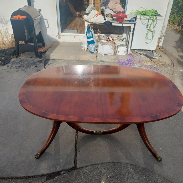 Bring timeless elegance to your dining space with this exceptional mid-to-late 20th-century Regency Revival double-...