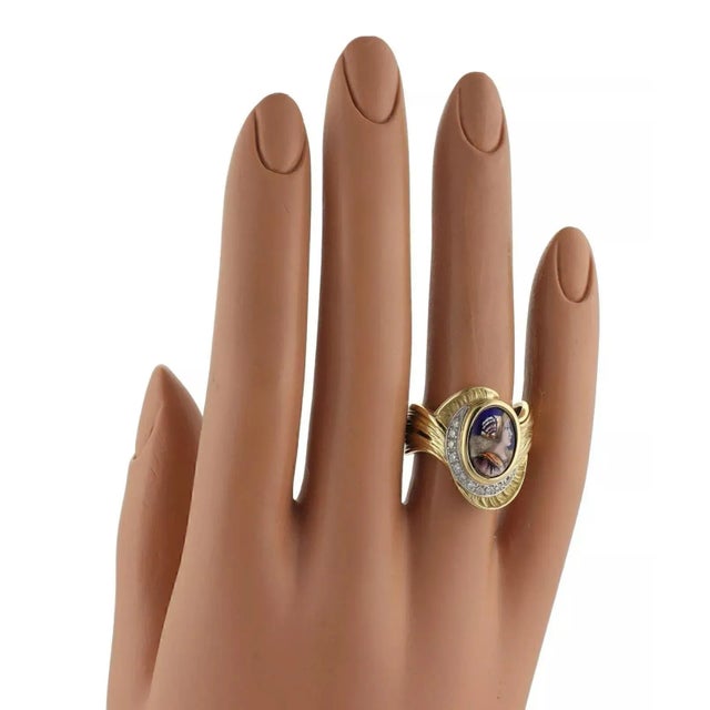 Material: 18k yellow gold and platinum Hallmark: Mitsuo Kaji Pt900 K18 Diamond: 10 points Measurement: front: 0.75" across...