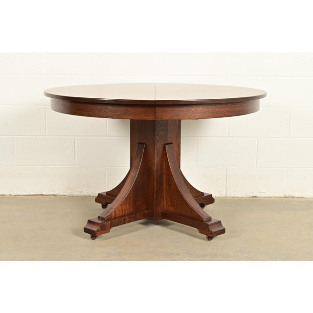 An exceptional antique Mission oak Arts & Crafts pedestal extension dining table By Stickley Brothers USA, Circa 1910...