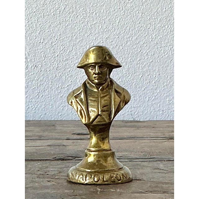 This charming vintage miniature bust captures the iconic pensive gaze of Napoleon Bonaparte, a figure synonymous with...