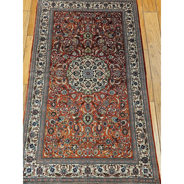 This extraordinary vintage Turkish Hereke silk rug represents the absolute pinnacle of Ottoman textile artistry. The...