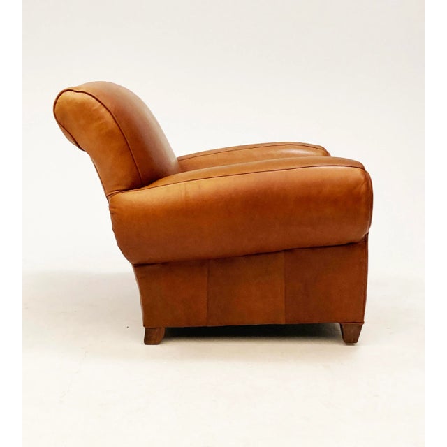 When you think of that perfect club chair with the beautifully worn tan leather, this is the one. This tan camel leather...