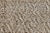 Textural jute woven rug in ivory, beige, and silvery tones. Please note that its appearance may vary depending on lighting...