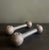 A striking pair of vintage cast iron barbells with beautifully aged patina and classic industrial form. Each barbell...