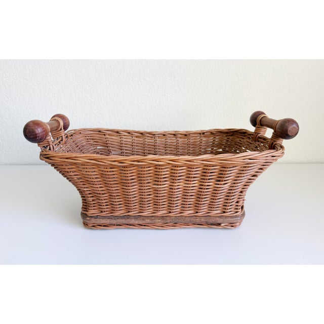 An early to mid-20th-century French boulangerie shop basket. This unique, handmade vintage basket features a rectangular...