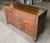 19th century Welsh oak dresser base. 3 drawers over 2 doors and 2 faux bottom drawers, paneled doors and bracket feet.