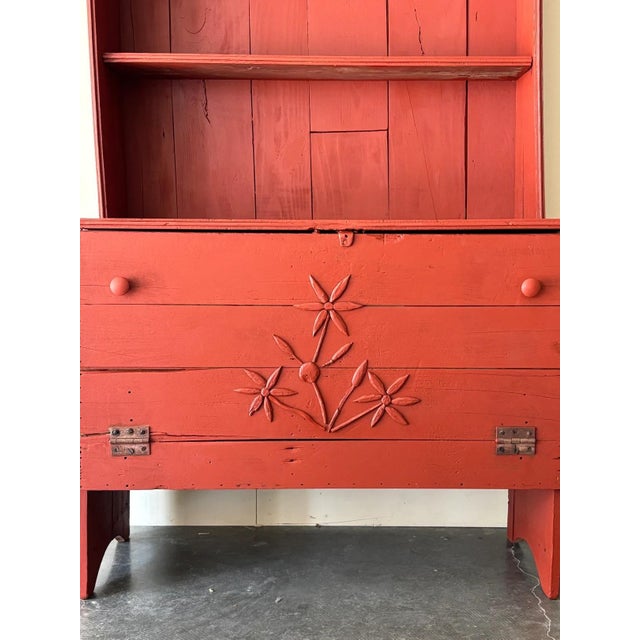 Handmade folk art painted wooden hutch with hand cut floral detailing. Pull down storage perfect for blankets or storage....