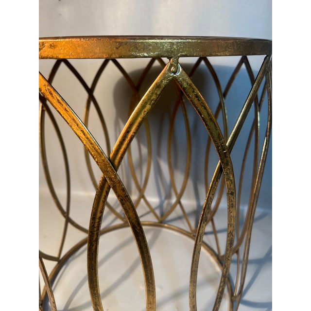 A playfully eclectic round drum table attributed to Elk Home Sutton line after Valerie Parr Hill. Has a round top with a...