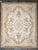 This circa 1950 French Aubusson rug showcases a classic ornamental design with a central medallion enclosed within a...