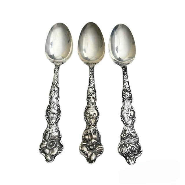 A beautiful set of three American zodiac sterling silver spoons decorated with floral motifs by R Wallace & Sons produced...
