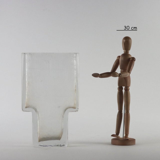 Ice effect solid glass vase. Manufacture mark under the base. This piece is attributed to the mentioned designer/maker. It...