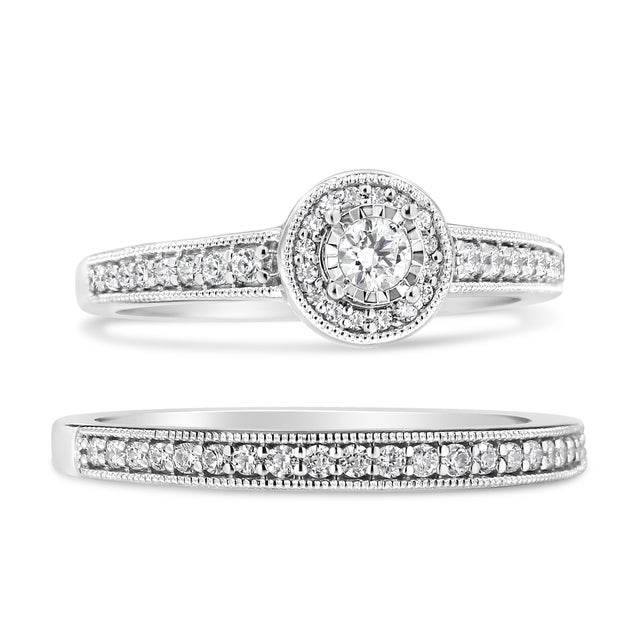Immerse yourself in the sheer elegance of this bridal set, beautifully crafted from rhodium-plated .925 sterling silver...