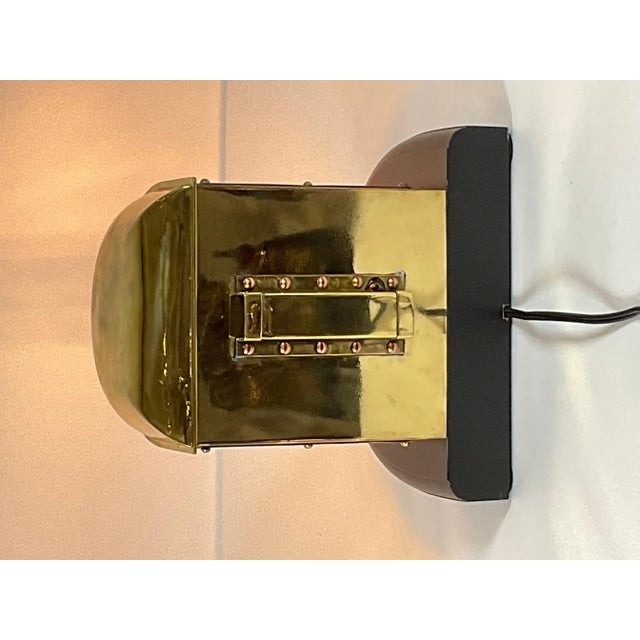 Ships lantern with beautiful dioptric lens and protective brass bar. Meticulously polished and lacquered. Mounted to a...