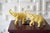 This listing is for a sweet pair of vintage, ceramic elephant figurines. They include gilded details. These are NOT heavy...