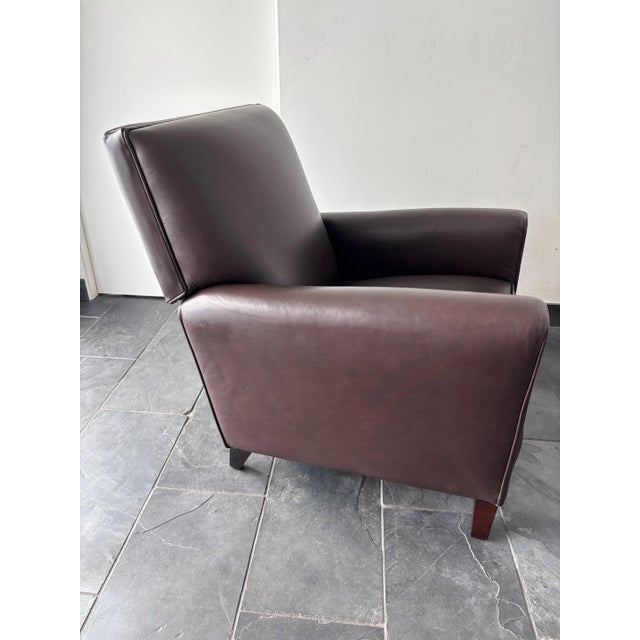 Art Deco style, medium brown leather Recliner by Room & Board, produced by American Leather in 2008. This comfy club chair...