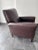 Art Deco style, medium brown leather Recliner by Room & Board, produced by American Leather in 2008. This comfy club chair...