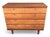 This beautifully restored Mid-Century Modern walnut chest of drawers is a timeless example of clean architectural design...