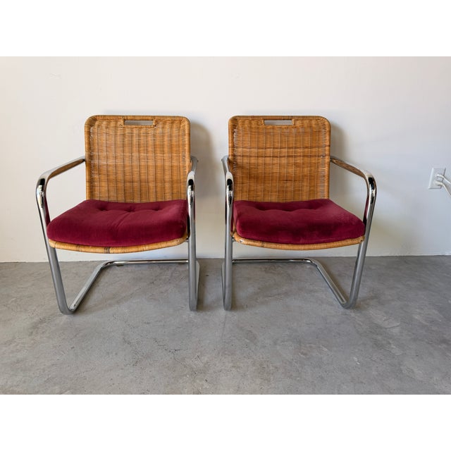 A striking pair of Harvey Probber style Chromcraft dining armchairs showcasing iconic Mid Century Modern design. Featuring...