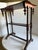 This antique Victorian table is very unique featuring the bobbin/spool legs and the four finials typical of the Victorian...