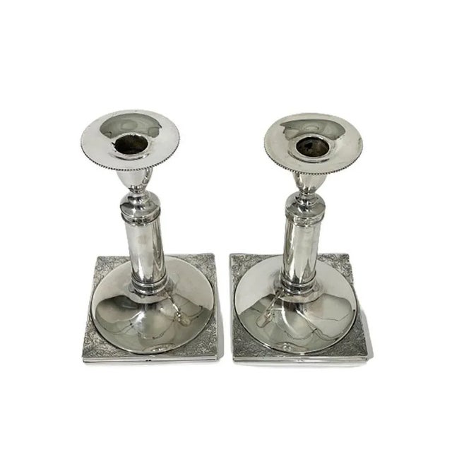 Dutch silver candleholders, mid-20th century. A set of candleholders Dutch silver hallmarked with the Master sign of...