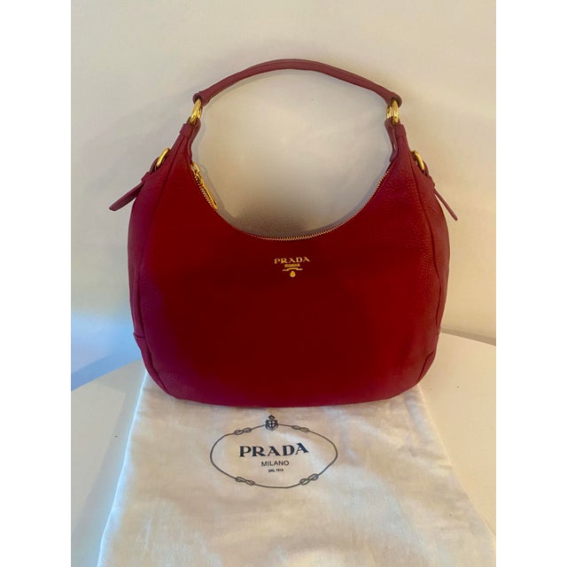 Prada Shoulder Hobo Bag in Vitello Diaino Leather. This is a shoulder bag or tote. THE IN COLOR - DEEP BURGUNDY. This...