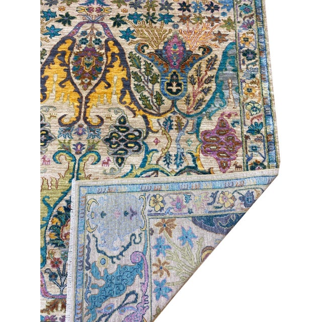 This Rug is a stunning fusion of tradition and artistry, where intricate floral motifs unfold in a mesmerizing balance of...