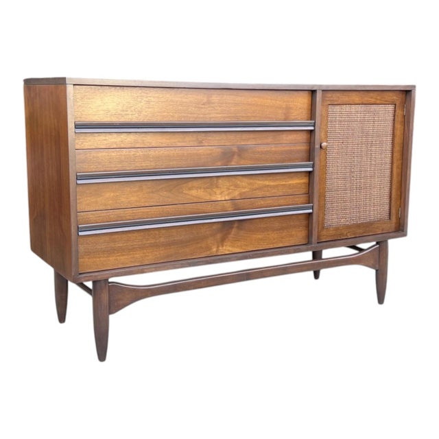 This professionally restored mid-century modern walnut cabinet beautifully showcases the clean sophistication and...
