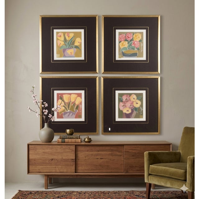 Charming set of four vintage floral still-life prints, each depicting a different stylized arrangement of flowers...