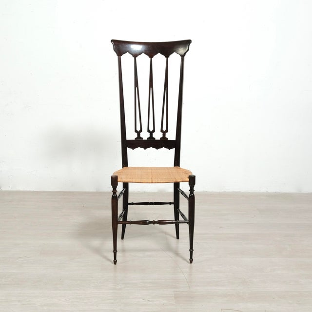 High back chair called "Chiavarina", these chairs were expertly built in the 1960s in Chiavari, a city renowned for the...