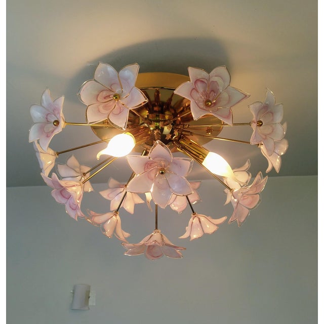 Add an elegant and romantic touch to your space with this pink Murano style flower flush mount ceiling light. The glass...