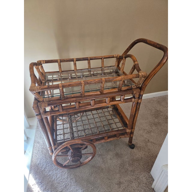 Gorgeous craftsmanship on this bamboo serving cart. Designed with both beauty and function in mind, it features a clever...