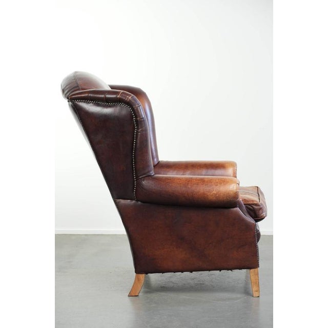 Vintage English Cowhide Wing Armchair For Sale - Image 3 of 13