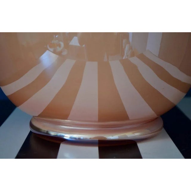 This superb Italian vase made of multilayer glass is a beautiful illustration of the know-how of Murano glassmakers. It’s...