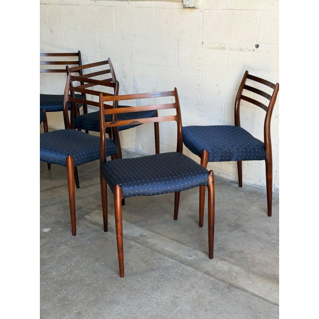 These elegant ladder back dining chairs feature a sculptural profile and organic lines. The gently curved backrests...