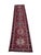 Vintage Persian Karajeh runner rug, hand-knotted in Iran from 100% wool. Measuring 2’8” x 11’2”, the rug features a...